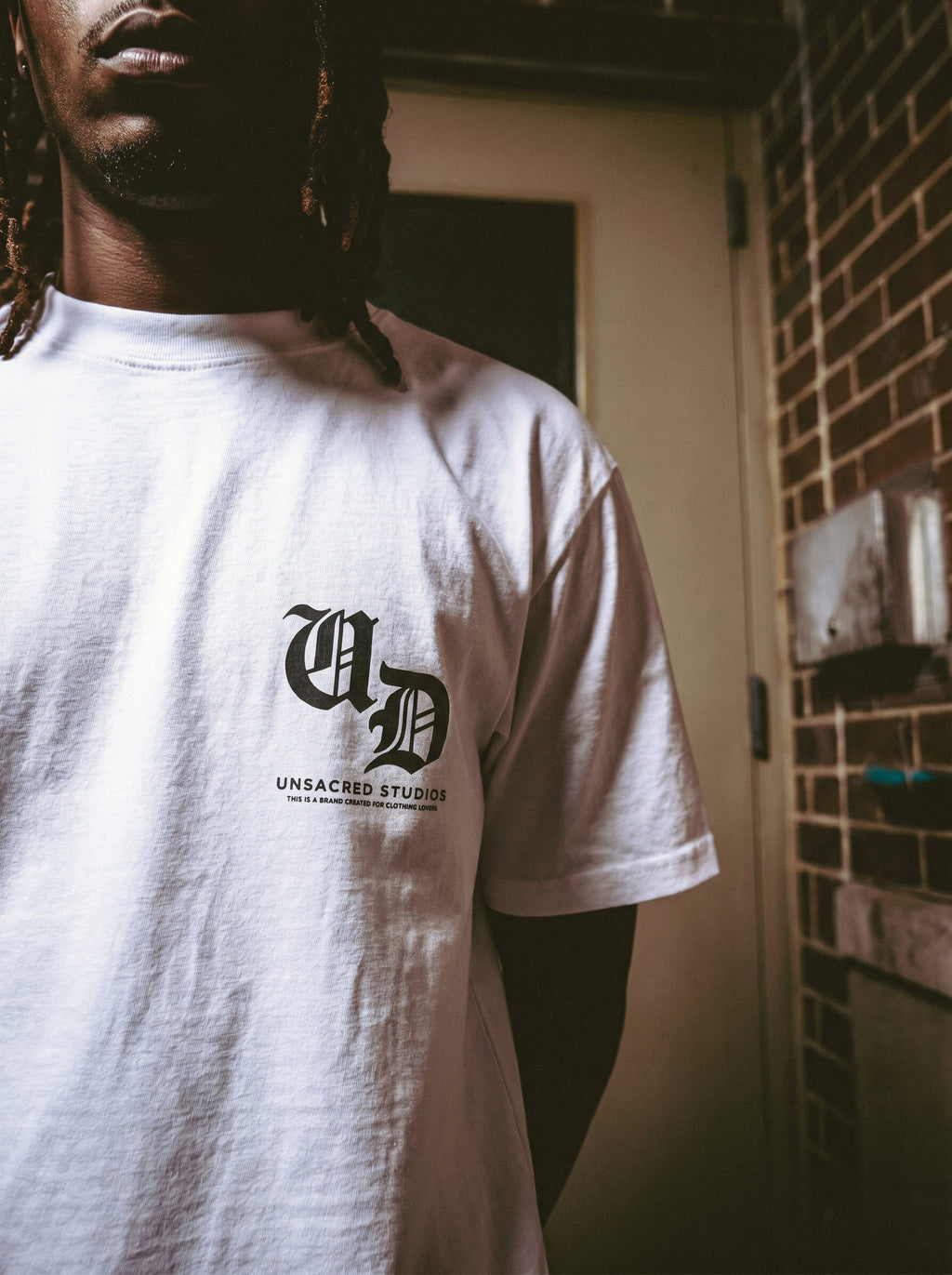 UNSACRED - MONOGRAM TEE