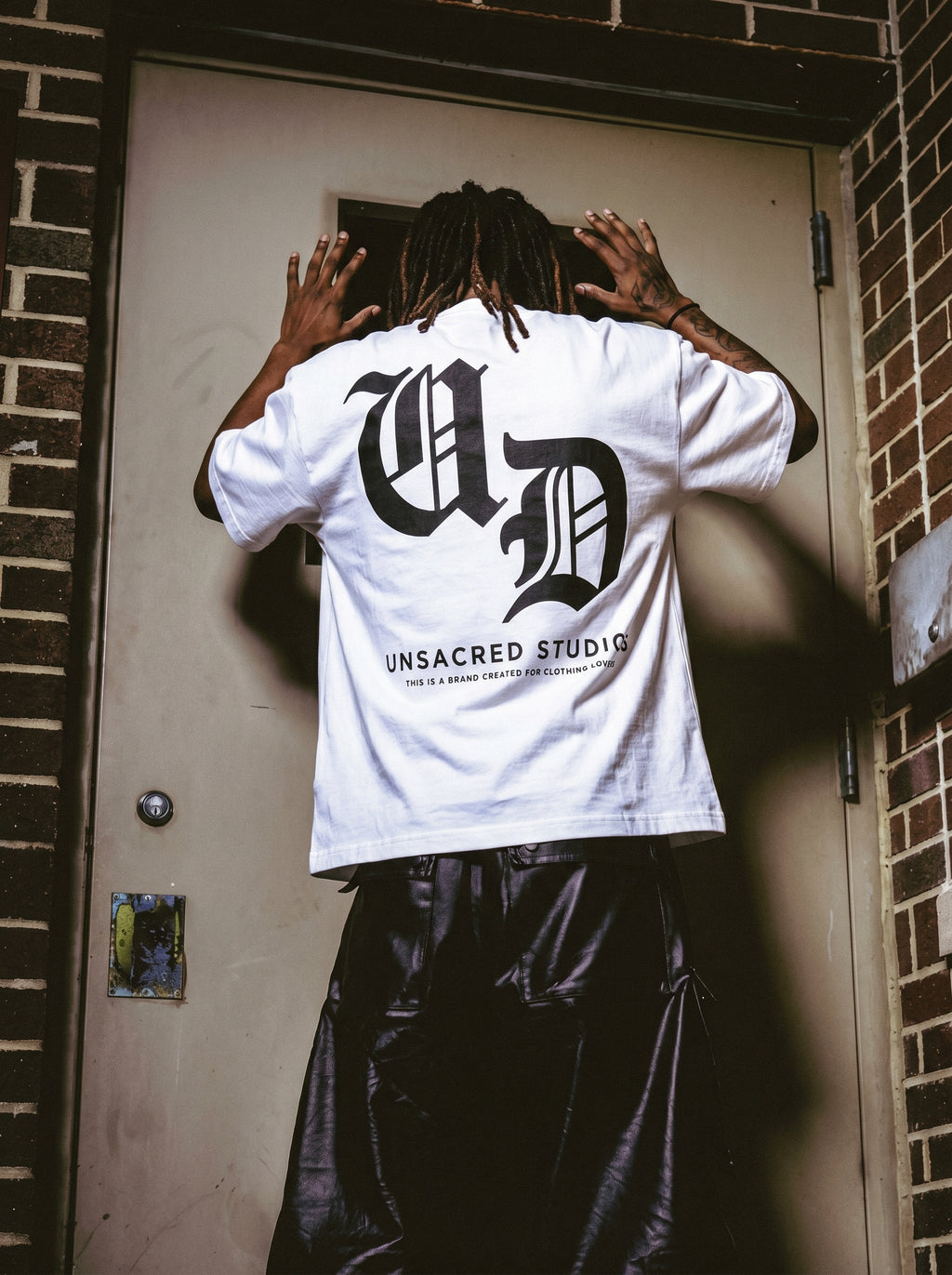 UNSACRED - MONOGRAM TEE